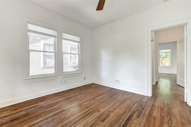 4412 Red River St, Austin, TX 78751 - spare room featuring dark wood-style flooring and a ceiling fan
