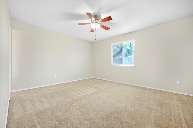 311 Carol Ave, Leander, TX 78641 - spare room featuring ceiling fan and carpet