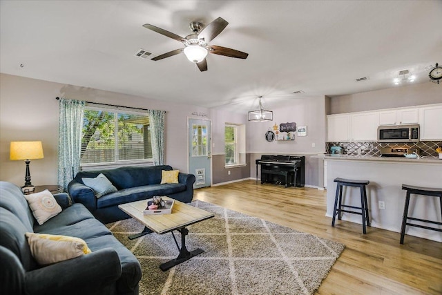 1141 Stone Forest Trl, Round Rock, TX 78681 - living area with ceiling fan and light wood-style flooring