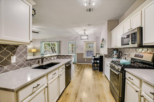 1141 Stone Forest Trl, Round Rock, TX 78681 - kitchen featuring stainless steel appliances, tasteful backsplash, and light countertops