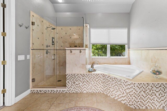 2261 Hamlet Cir, Round Rock, TX 78664 - full bath with a bath, a shower stall, and tile patterned flooring