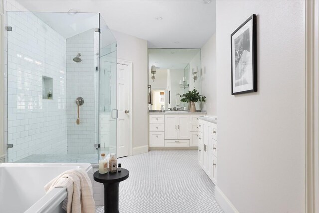 1904 Meadowbrook Dr, Austin, TX 78703 - full bath with vanity, a shower stall, and a tub to relax in
