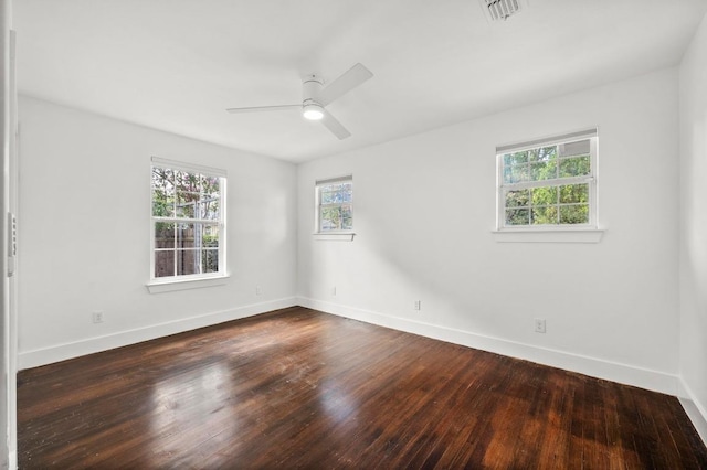 4706 Louis Ave, Austin, TX 78721 - unfurnished room with dark wood finished floors and a ceiling fan