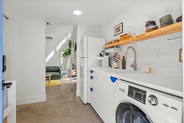 4706 Louis Ave, Austin, TX 78721 - washroom with washer / dryer and a wall mounted AC