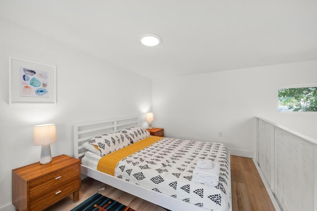 4706 Louis Ave, Austin, TX 78721 - bedroom with wood finished floors and baseboards