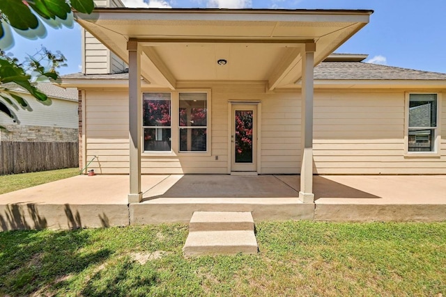 1921 Sand Creek Rd, Cedar Park, TX 78613 - doorway to property featuring a patio and a shingled roof