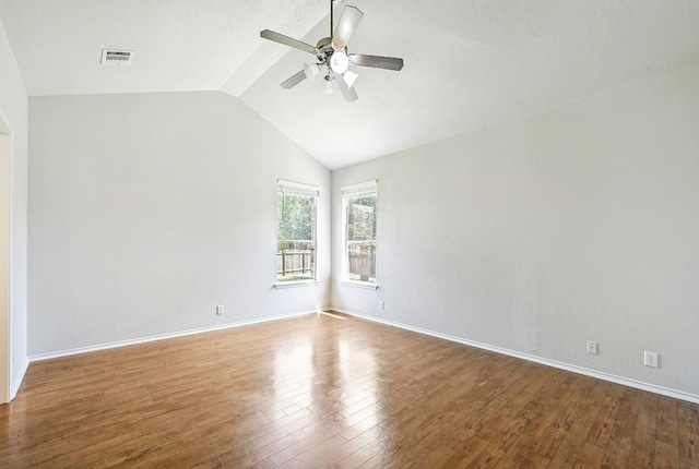 1921 Sand Creek Rd, Cedar Park, TX 78613 - spare room with ceiling fan, lofted ceiling, and wood finished floors
