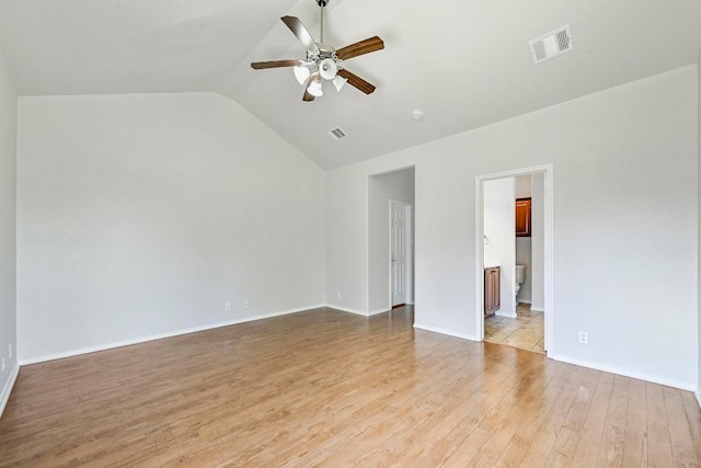 1921 Sand Creek Rd, Cedar Park, TX 78613 - unfurnished room featuring ceiling fan, light wood finished floors, and vaulted ceiling