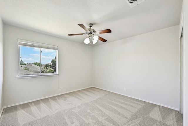 1921 Sand Creek Rd, Cedar Park, TX 78613 - spare room featuring carpet flooring and a ceiling fan