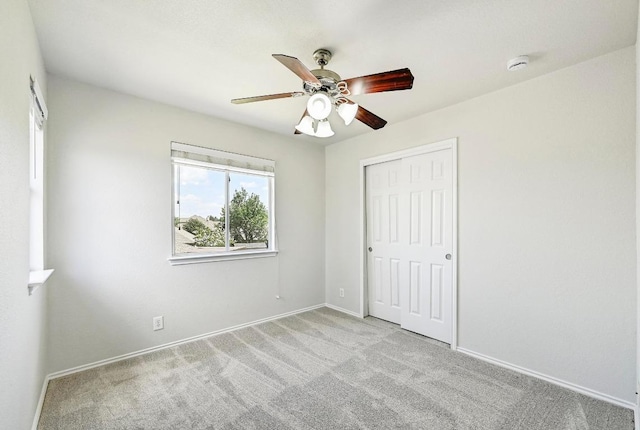 1921 Sand Creek Rd, Cedar Park, TX 78613 - unfurnished bedroom with carpet floors, a closet, and a ceiling fan