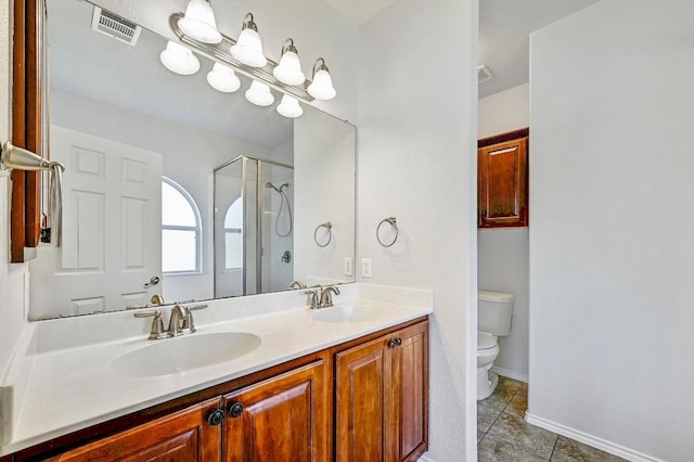 1921 Sand Creek Rd, Cedar Park, TX 78613 - full bathroom featuring tile patterned flooring, double vanity, and an enclosed shower