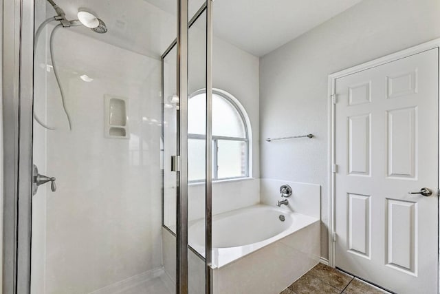 1921 Sand Creek Rd, Cedar Park, TX 78613 - bathroom featuring a stall shower, a garden tub, and tile patterned floors