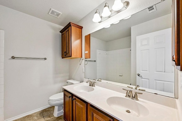 1921 Sand Creek Rd, Cedar Park, TX 78613 - full bathroom featuring double vanity, tiled shower, and tile patterned floors