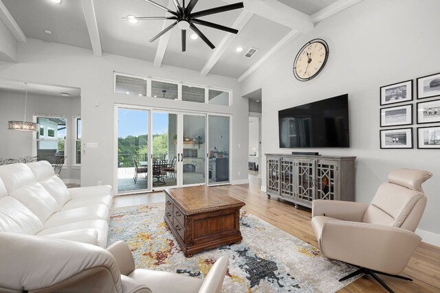 2250 Meritage, New Braunfels, TX 78132 - living area featuring beam ceiling, wood finished floors, high vaulted ceiling, and recessed lighting