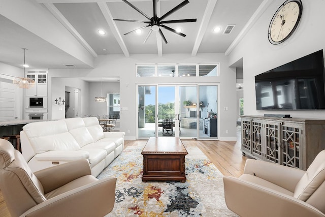 2250 Meritage, New Braunfels, TX 78132 - living area featuring a ceiling fan, light wood-style flooring, beam ceiling, recessed lighting, and a high ceiling