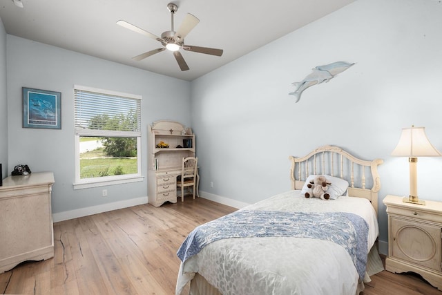 2250 Meritage, New Braunfels, TX 78132 - bedroom with wood finished floors and a ceiling fan