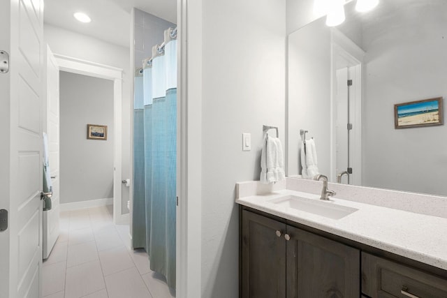 2250 Meritage, New Braunfels, TX 78132 - full bathroom with vanity, tile patterned flooring, recessed lighting, and a shower with shower curtain