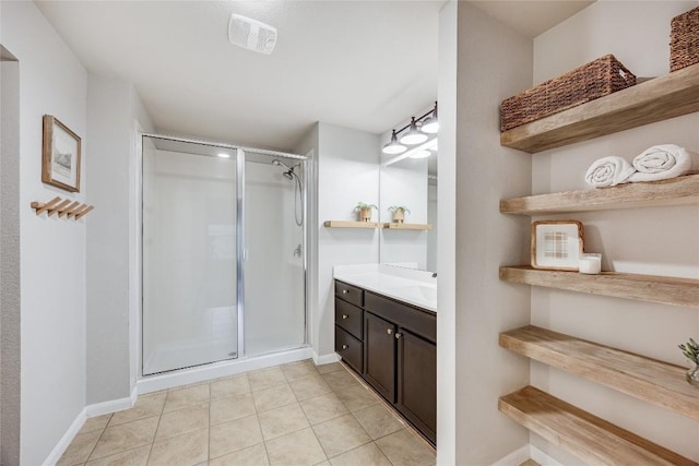 605 Liard River Rd, Hutto, TX 78634 - full bath with vanity, a shower stall, and tile patterned flooring