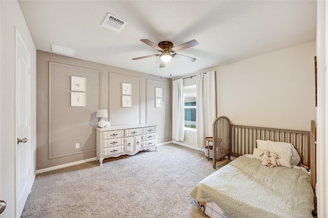 605 Liard River Rd, Hutto, TX 78634 - carpeted bedroom with a ceiling fan and baseboards
