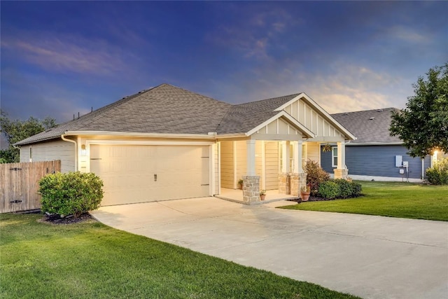 605 Liard River Rd, Hutto, TX 78634 - craftsman house featuring driveway, a garage, a shingled roof, and board and batten siding