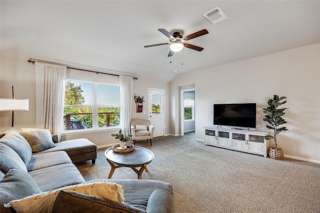 605 Liard River Rd, Hutto, TX 78634 - living area featuring carpet floors, ceiling fan, healthy amount of natural light, and lofted ceiling