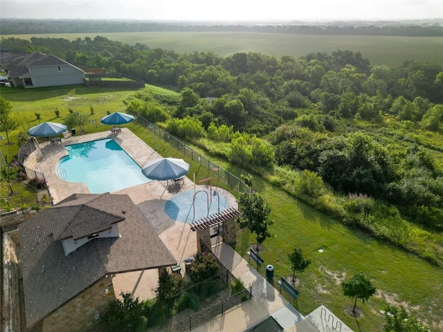 605 Liard River Rd, Hutto, TX 78634 - drone / aerial view of a pool area and a heavily wooded area