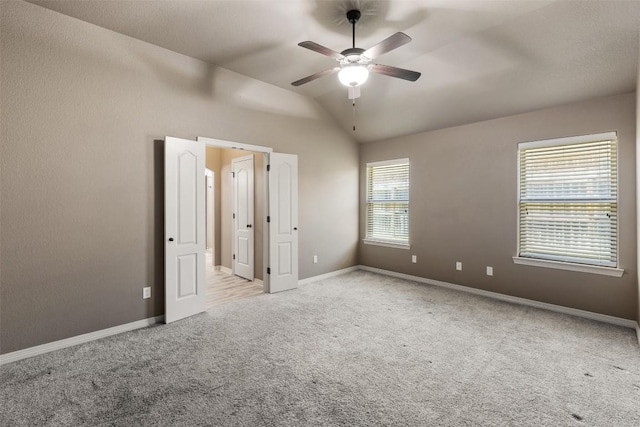 8305 Split Trail Cv, Temple, TX 76502 - unfurnished bedroom featuring carpet, vaulted ceiling, and a ceiling fan