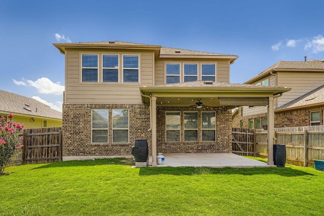 16912 Alturas Ave, Pflugerville, TX 78660 - rear view of house with a patio area, ceiling fan, a fenced backyard, and brick siding