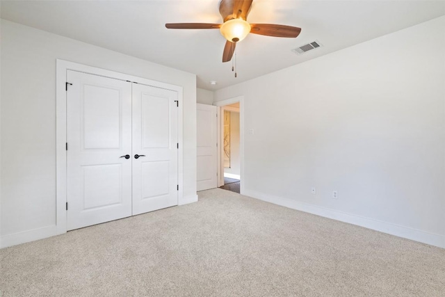 4104 Honeycomb Rock Cir, Austin, TX 78731 - unfurnished bedroom with carpet flooring, a closet, and a ceiling fan