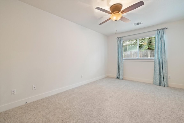 4104 Honeycomb Rock Cir, Austin, TX 78731 - unfurnished room featuring a ceiling fan and light carpet