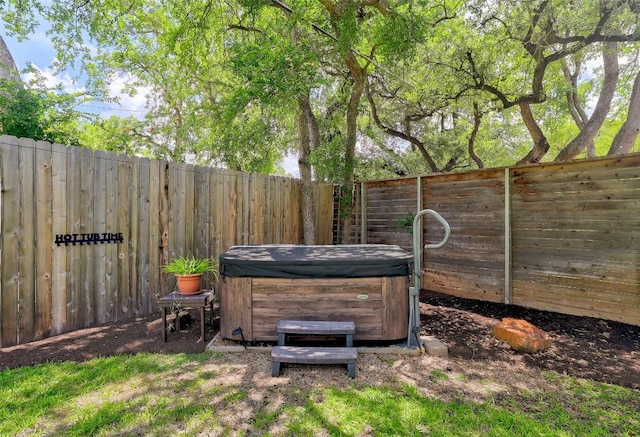 4104 Honeycomb Rock Cir, Austin, TX 78731 - fenced backyard with a hot tub