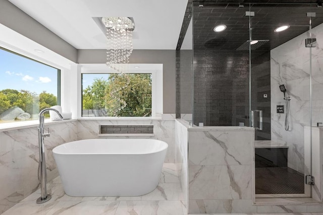 3501 Lost Pine Cv, Austin, TX 78739 - bathroom with a marble finish shower, a chandelier, a freestanding tub, marble tiled flooring, and tile walls