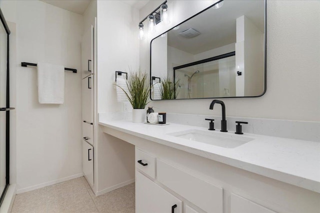 8432 Antero Dr, Austin, TX 78759 - bathroom with a stall shower, vanity, and tile patterned floors