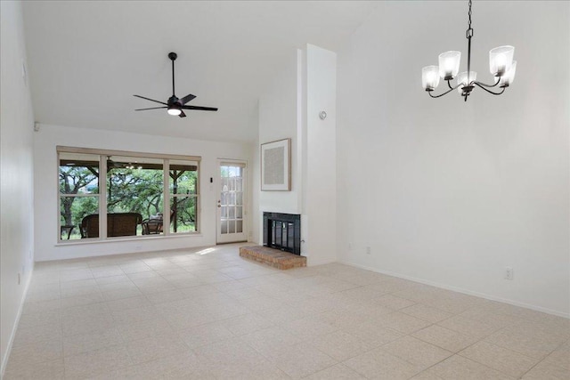 8432 Antero Dr, Austin, TX 78759 - unfurnished living room featuring high vaulted ceiling, a chandelier, ceiling fan, and a brick fireplace