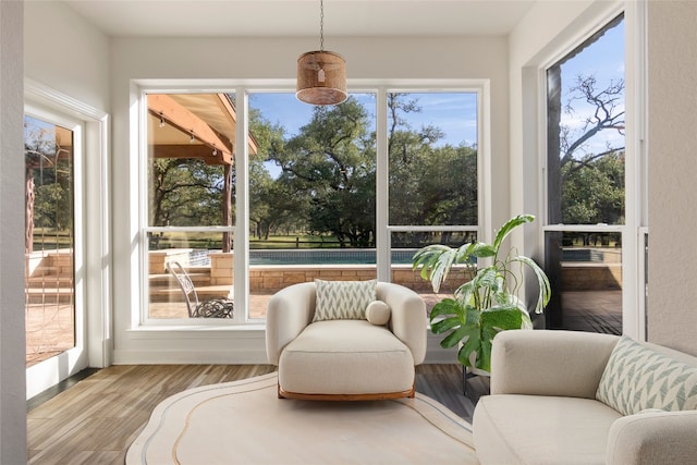 790 Enchanted Oaks Dr, Driftwood, TX 78619 - sunroom featuring wood finished floors