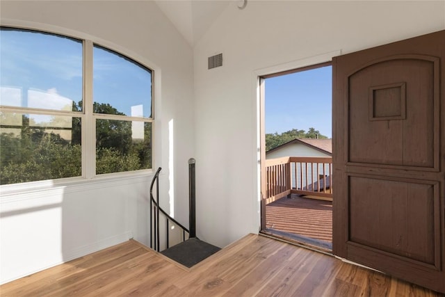 790 Enchanted Oaks Dr, Driftwood, TX 78619 - unfurnished room with wood finished floors and vaulted ceiling