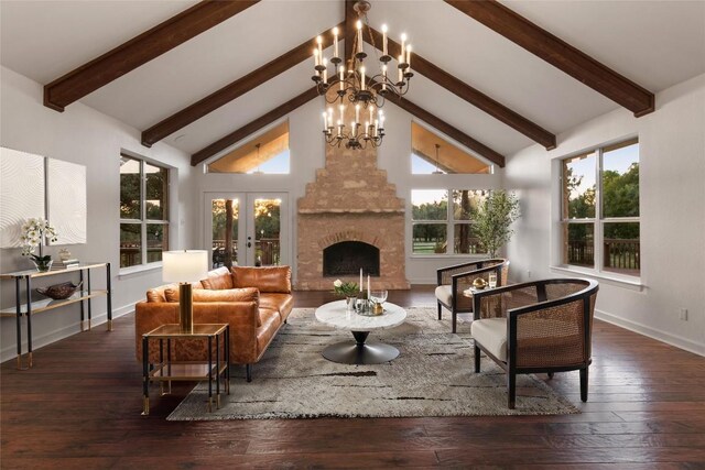 790 Enchanted Oaks Dr, Driftwood, TX 78619 - living area with french doors, a chandelier, wood-type flooring, a stone fireplace, and healthy amount of natural light