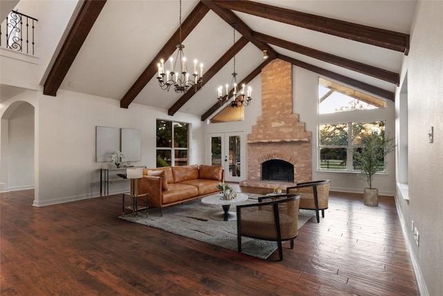 790 Enchanted Oaks Dr, Driftwood, TX 78619 - living room with french doors, beamed ceiling, high vaulted ceiling, a chandelier, and wood-type flooring