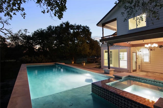790 Enchanted Oaks Dr, Driftwood, TX 78619 - swimming pool featuring an in-ground hot tub and a patio area