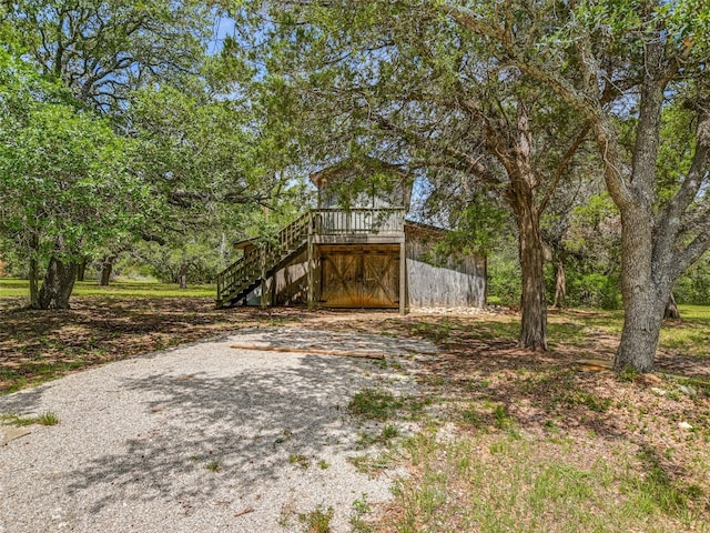 900 Crk 282, Liberty Hill, TX 78642 - view of yard featuring stairs and a wooden deck