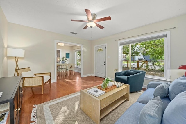 1209 Payne Ave, Austin, TX 78757 - living area with ceiling fan and wood finished floors
