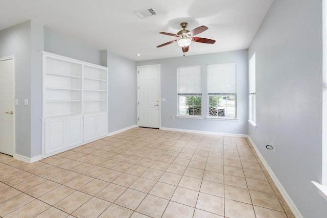 113 Stetson Trl, Georgetown, TX 78633 - spare room with a ceiling fan and light tile patterned floors