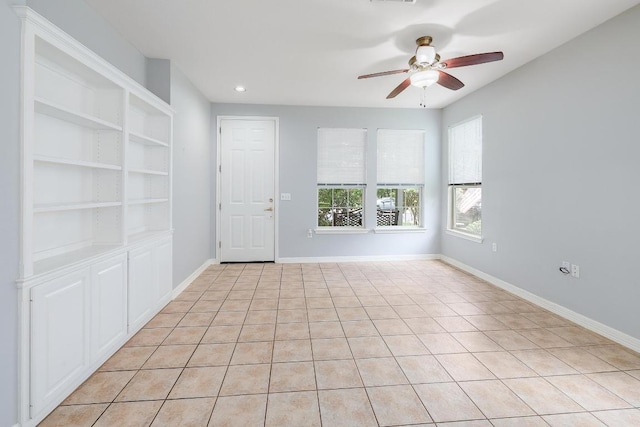 113 Stetson Trl, Georgetown, TX 78633 - empty room with ceiling fan, built in features, light tile patterned floors, and recessed lighting
