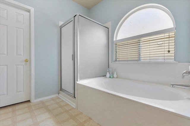 2818 Shadowpoint Cv, Round Rock, TX 78665 - full bathroom with a shower stall, a garden tub, and tile patterned floors