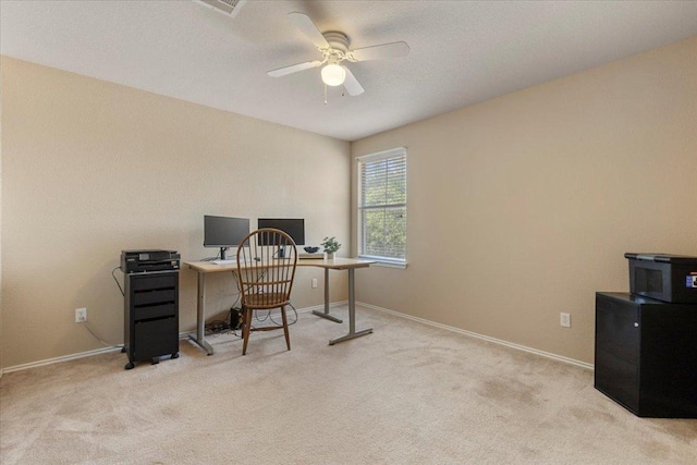 2818 Shadowpoint Cv, Round Rock, TX 78665 - carpeted home office with a ceiling fan and baseboards