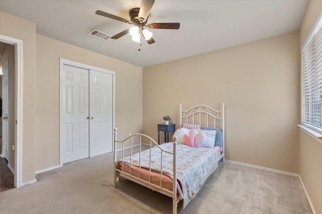 2818 Shadowpoint Cv, Round Rock, TX 78665 - bedroom featuring carpet, multiple windows, and a closet