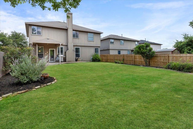 2818 Shadowpoint Cv, Round Rock, TX 78665 - back of property featuring a fenced backyard and a chimney