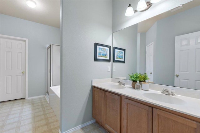 2818 Shadowpoint Cv, Round Rock, TX 78665 - bathroom featuring a shower with shower door, tile patterned floors, double vanity, and a tub