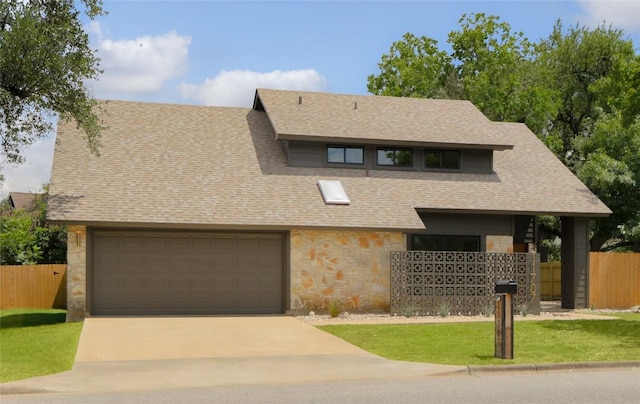 11707 Barrington Way, Austin, TX 78759 - view of front of house with stone siding, concrete driveway, and a shingled roof