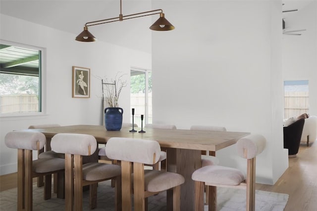 11707 Barrington Way, Austin, TX 78759 - dining area featuring light wood-type flooring and baseboards